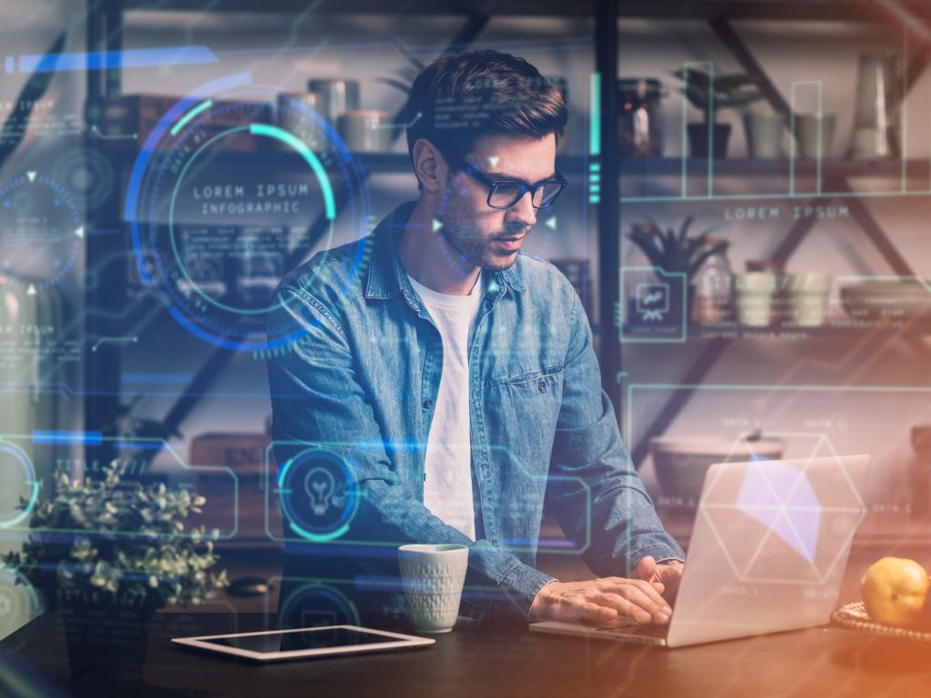 Person working on HTML code on a computer.